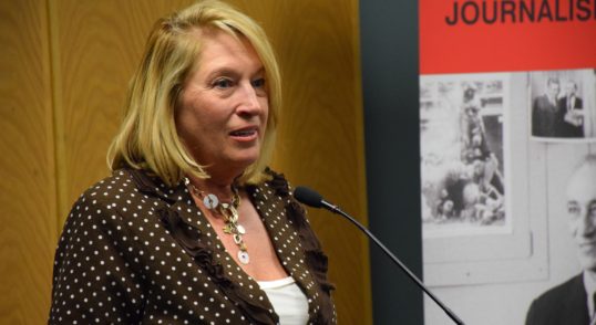 Image of Susan Fornoff accepting the Distinguished Terrapin award